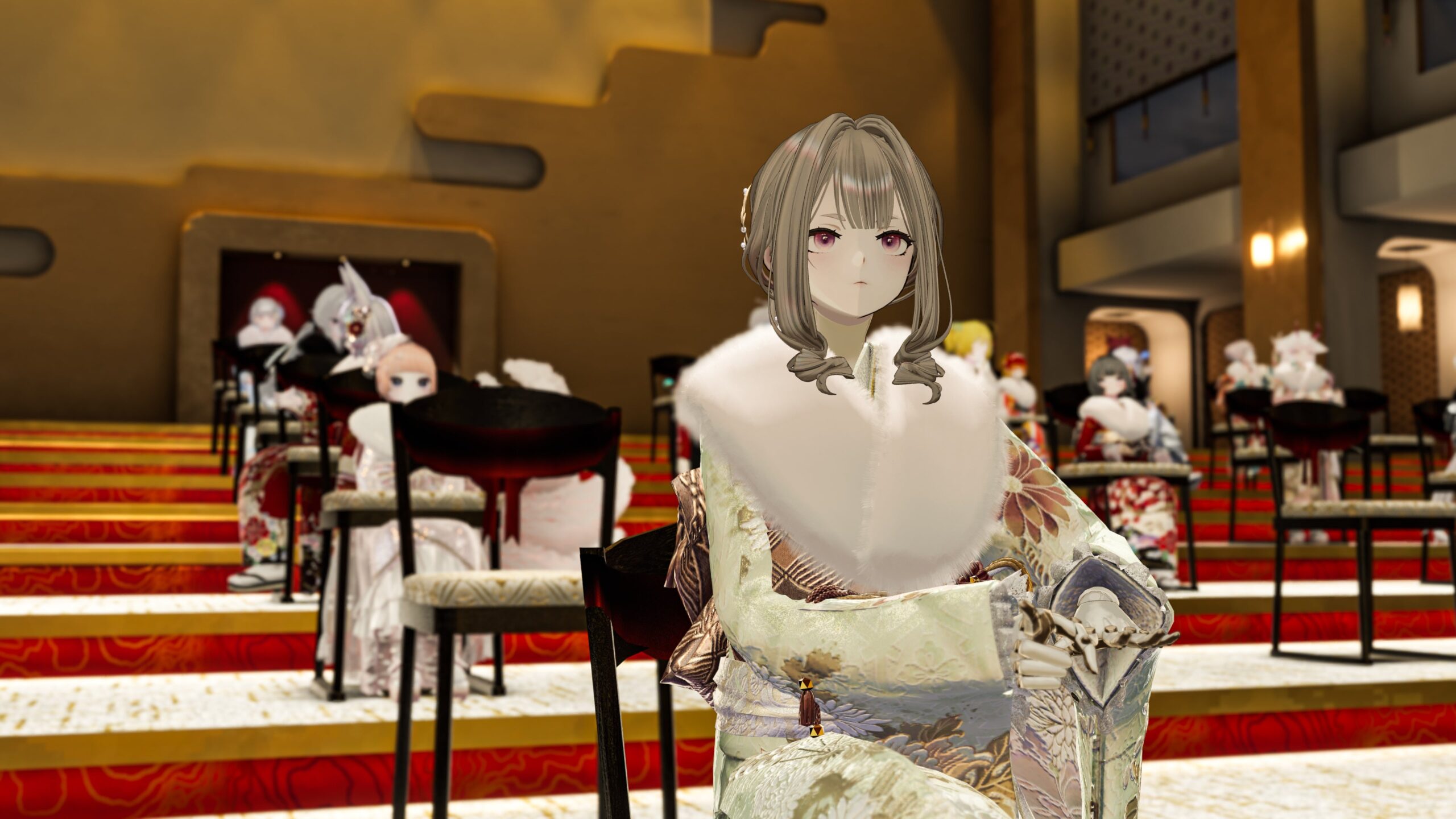 成人式で座る若者たちの様子