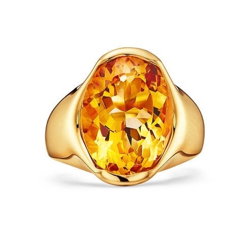 大きな黄色の宝石を配したリング