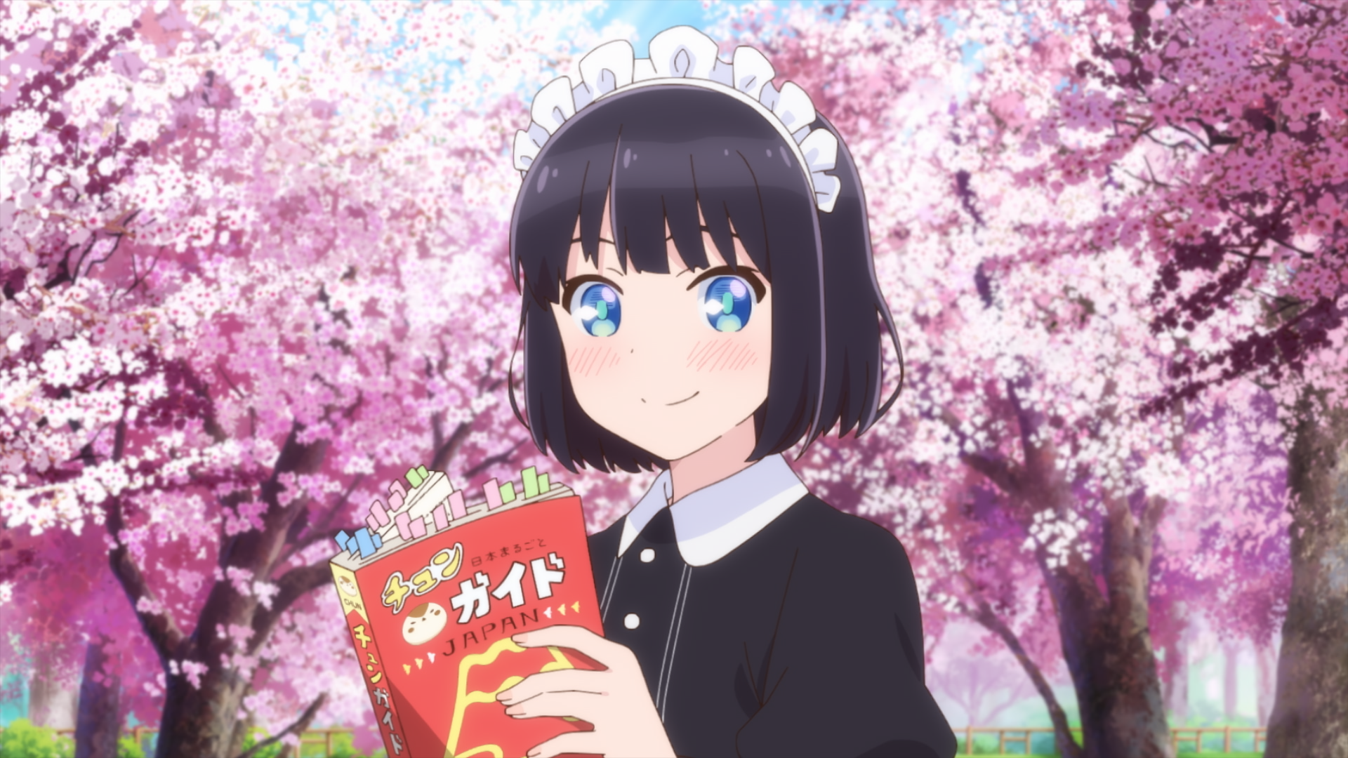 桜の前でガイド本を持つメイド
