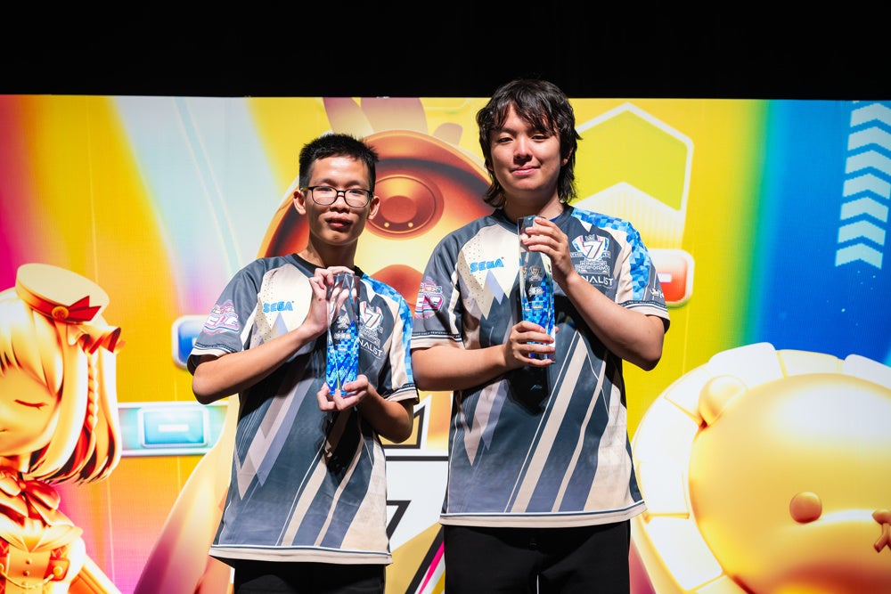 音ゲー大会での優勝者の笑顔