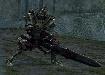 鎧を纏った戦士が剣を構える