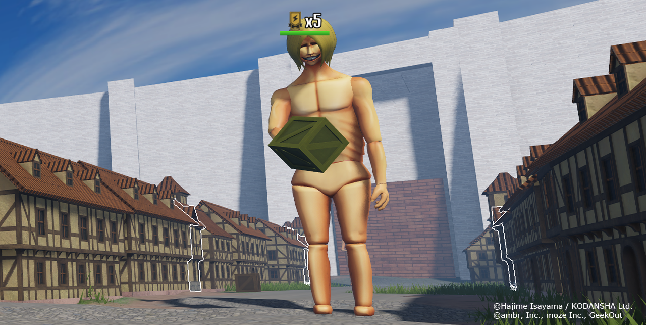 町中で巨大なキャラクターが箱を持つ