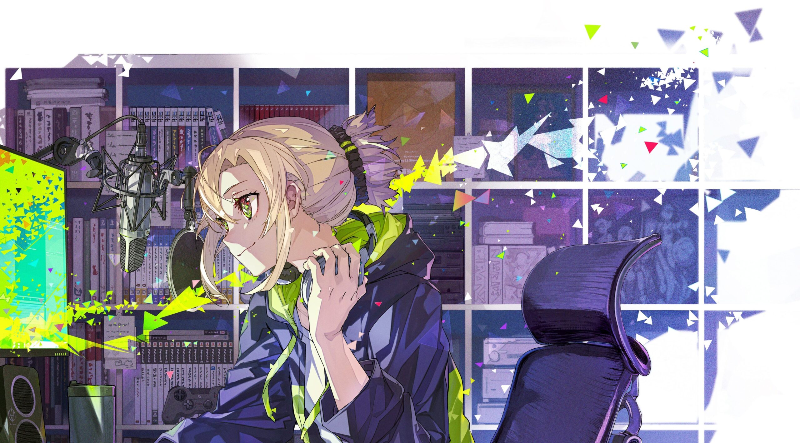 VTuber用マイクセットと集中する人物