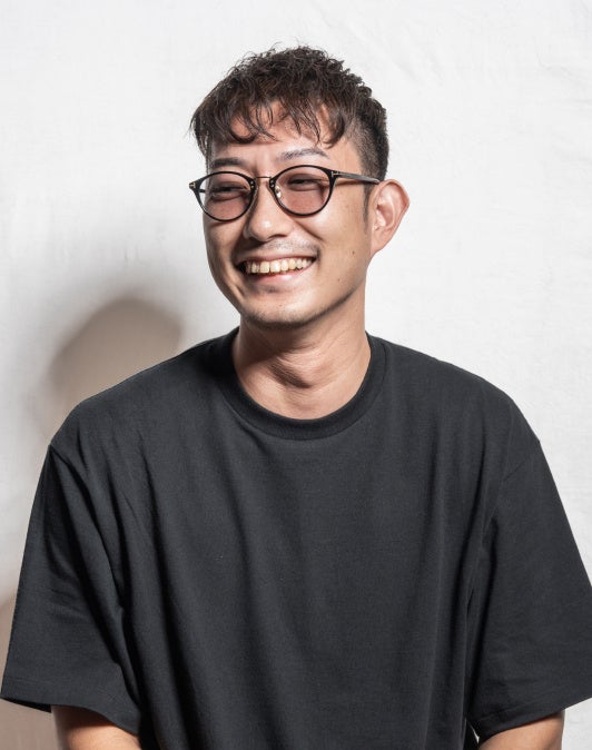 笑顔の男性人物イマーシブエンターテインメント